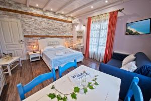 Postel nebo postele na pokoji v ubytování Flamingo Hotel Pelion - Seaside Superior Studios & Suites