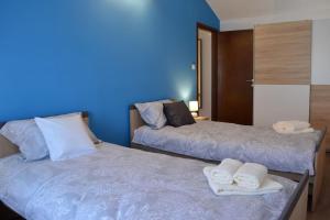 Posteľ alebo postele v izbe v ubytovaní Amarena Holiday Home in Škrljevo
