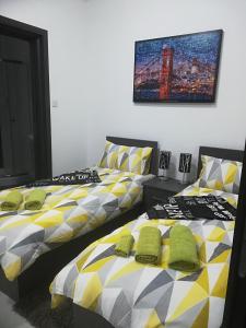 Lova arba lovos apgyvendinimo įstaigoje Nice and cosy apartment close to seafront