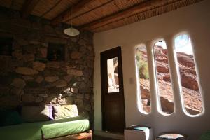 Postel nebo postele na pokoji v ubytování Cabañas Azul Andino