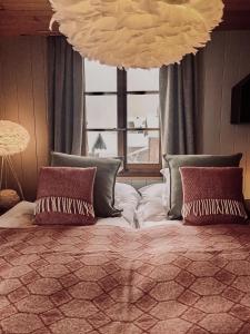 Postel nebo postele na pokoji v ubytování Hôtel Le Grand Chalet Favre