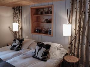 Postel nebo postele na pokoji v ubytování Hôtel Le Grand Chalet Favre