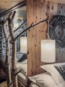 Postel nebo postele na pokoji v ubytování Hôtel Le Grand Chalet Favre