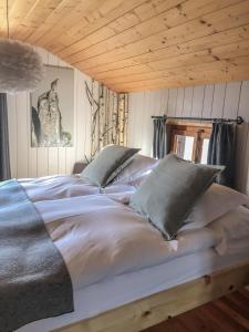 Postel nebo postele na pokoji v ubytování Hôtel Le Grand Chalet Favre