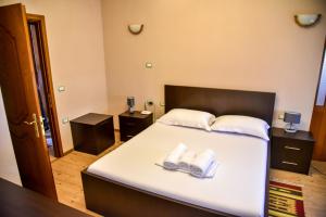 Postel nebo postele na pokoji v ubytování Hotel Sofra