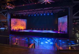 a stage with purple and blue lights on it at SAHARA Las Vegas in Las Vegas