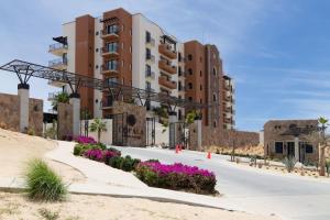 an empty street in front of a building at Cabo Cottage Copala · Stunning * Luxury Ocean View 2BR*Resort Living in Cabo San Lucas