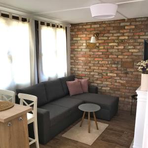 Posezení v ubytování Aranypart Apartmanházak Tiszakécske