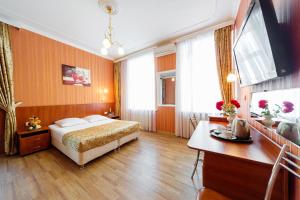 Cama o camas de una habitación en Hotel Tonika