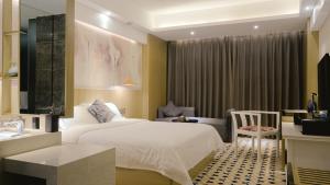 Paco Hotel Tianpingjia Metro Guangzhou - Free Shuttle Bus For Canton Fair客房内的一张或多张床位