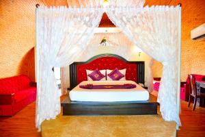Con Khuong Resort Can Tho客房内的一张或多张床位
