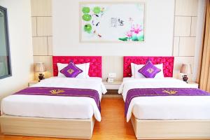 Con Khuong Resort Can Tho客房内的一张或多张床位