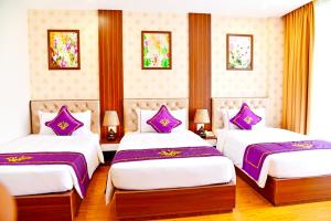 Con Khuong Resort Can Tho客房内的一张或多张床位
