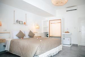 Voodi või voodid majutusasutuse The Koho Air Hotel toas