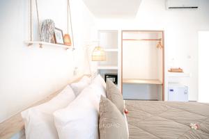 Voodi või voodid majutusasutuse The Koho Air Hotel toas