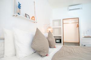 Voodi või voodid majutusasutuse The Koho Air Hotel toas