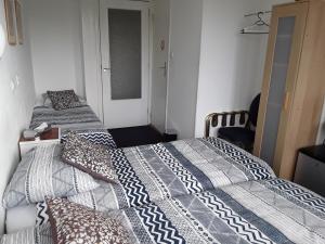 Postel nebo postele na pokoji v ubytování Hotel Baan