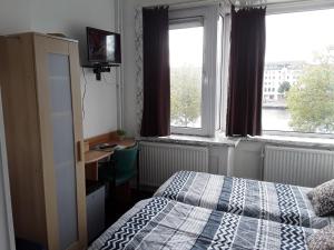 Postel nebo postele na pokoji v ubytování Hotel Baan