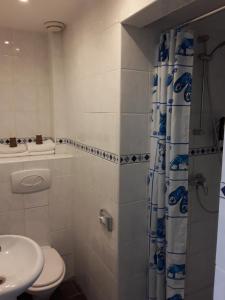 Koupelna v ubytování Hotel Baan