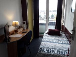 Postel nebo postele na pokoji v ubytování Hotel Baan
