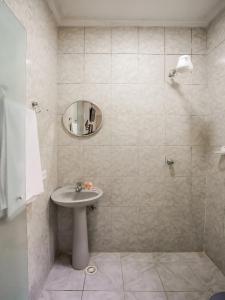A bathroom at Hotel Vouga
