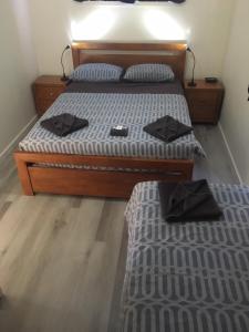 a bedroom with a bed and a desk at Oceanside Village in Denham