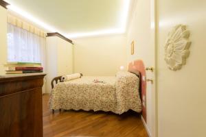 Postel nebo postele na pokoji v ubytování San Bartolomeo Suite