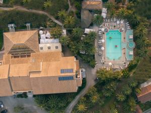 an overhead view of a house with a swimming pool at Art Hotel Debono in Gouvia