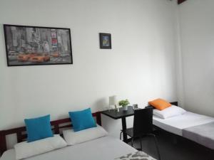 Postel nebo postele na pokoji v ubytování House of Seya