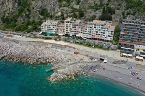 an aerial view of a beach with buildings and the water at Eolo in Deiva Marina