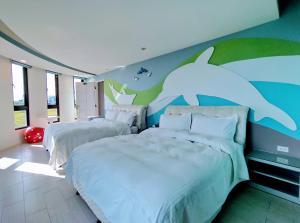 Krevet ili kreveti u jedinici u okviru objekta Shell Sand Homestay