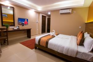 Ένα ή περισσότερα κρεβάτια σε δωμάτιο στο Hotel Lake Star