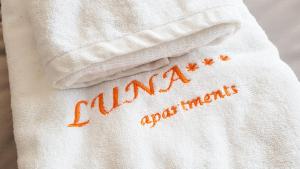 A bed or beds in a room at Apartment Luna Hrebienok C109