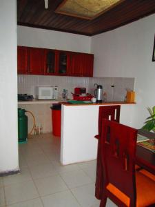 Virtuvė arba virtuvėlė apgyvendinimo įstaigoje Hotel Huito