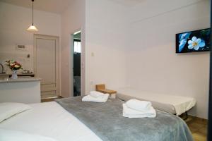 Letto o letti in una camera di Laganas Dreams 1