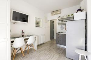 Kuchyň nebo kuchyňský kout v ubytování Apartments Villa Pina