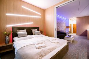 Posteľ alebo postele v izbe v ubytovaní Apartment Luna Hrebienok C108