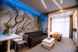 A seating area at Apartment Luna Hrebienok C111