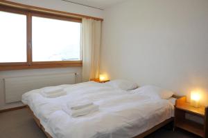 Krevet ili kreveti u jedinici u okviru objekta Résidence Mont-Parrain