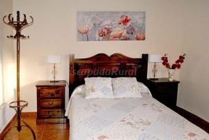 Кровать или кровати в номере Casa rural LA DEHESA