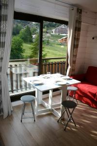 Posezení v ubytování Joli Studio à la Montagne