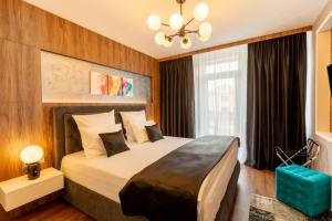 Ένα ή περισσότερα κρεβάτια σε δωμάτιο στο Bach Apartments