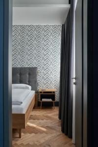 Postel nebo postele na pokoji v ubytování Hotel MIO by AMANO