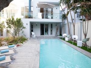 The swimming pool at or close to Zest Boutique Hotel by The Living Journey Collection