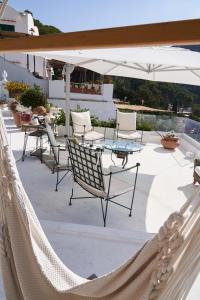 A balcony or terrace at VILLA MARINA PICCOLA ai FARAGLIONI