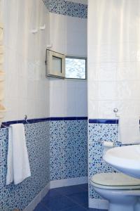 A bathroom at VILLA MARINA PICCOLA ai FARAGLIONI