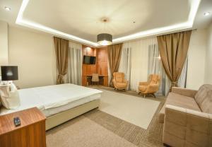Posteľ alebo postele v izbe v ubytovaní Hotel Lazaro