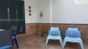A seating area at Adosado en playa de la Barrosa, casa Carlota