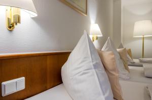 מיטה או מיטות בחדר ב-Hotel Gertrudenhof
