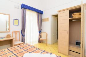 Postel nebo postele na pokoji v ubytování Villa Giusto